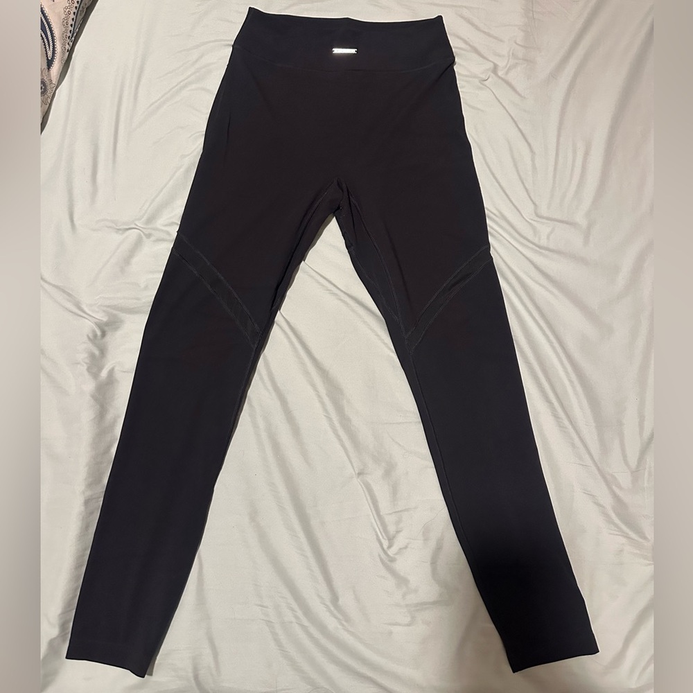 Whitney Simmons black leggings